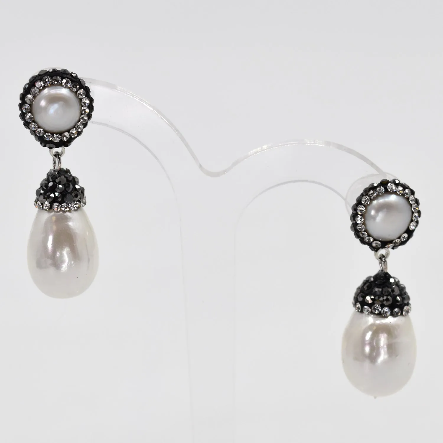 Delicate pearl drop earrings with crystal detail