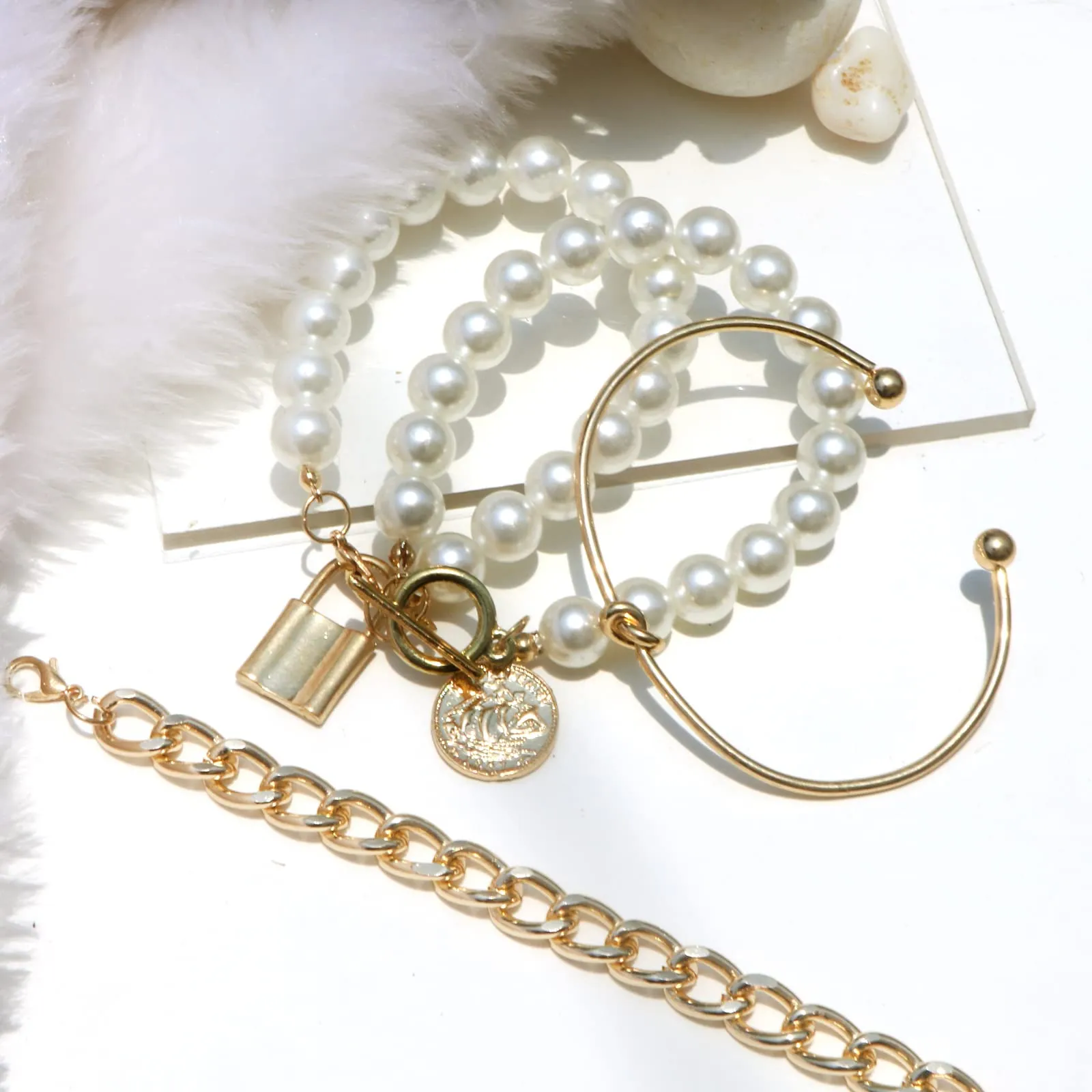 Lively Pearl and Gold Set of 4 Bracelets